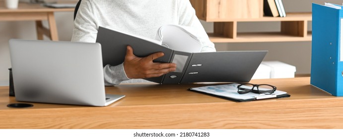 Man working with documents in office