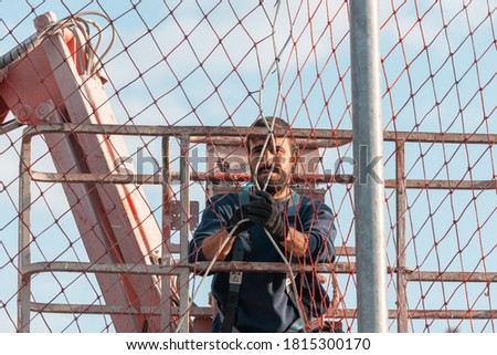 Similar – Image, Stock Photo young man simulating a photographic frame with his hands