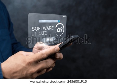 Man working and installing update process. Software updates or operating system upgrades to keep your device up to date with enhanced functionality in new versions and improved security.