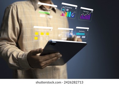 Man working with multi task dashboard on tablet computer, downloading, search engine, data analysis, data transfer via ai assistance. Technology and business analytic