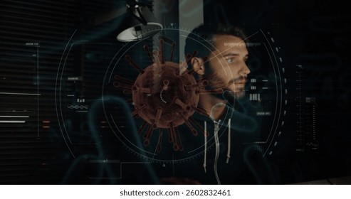 Man working on computer with digital virus graphic overlay, focused on screen. Cybersecurity, technology, malware, threat, security, protection - Powered by Shutterstock - Get 15% off with code: PIKWIZARD15