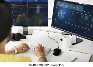 Man working on computer network graphic overlay