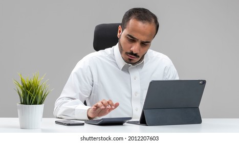 Man Working On His Tablet