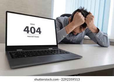 Man working on laptop, 404 error, the message on the screen page not found problem with loading=