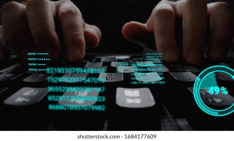 Man working on laptop computer keyboard with graphic user interface GUI hologram showing concepts of big data science technology, digital network connection and computer programming algorithm.