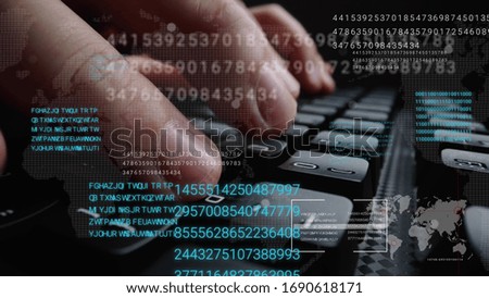 Man working on laptop computer keyboard with graphic user interface GUI hologram showing concepts of big data science technology, digital network connection and computer programming algorithm.