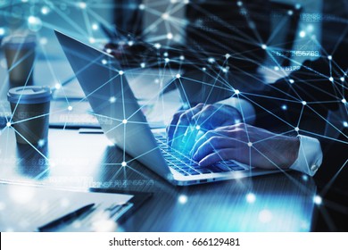 Man working on a laptop. Concept of internet sharing and interconnection - Shutterstock ID 666129481
