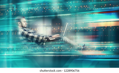 Man working on laptop in futuristic digital backgroud. High speed browsing .