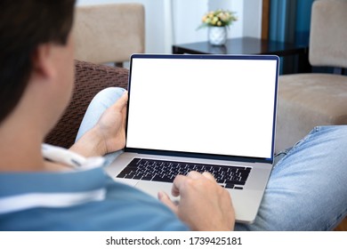 man working on laptop with isolated screen at home in the room - Shutterstock ID 1739425181