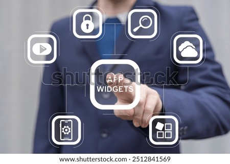Man working on virtual touch screen presses inscription: APP WIDGETS. App widget web mobile computer technology concept. Widgets apps.