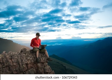 Man Working Outdoors With Laptop