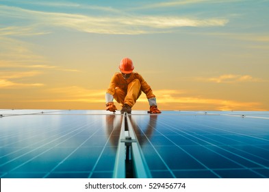 A man working at solar power station