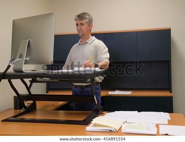 Man Working Stand Desk Office Where Stock Photo Edit Now 416891554