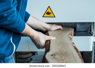 Man Working With Wood Machine. Unsafe Work With Machine