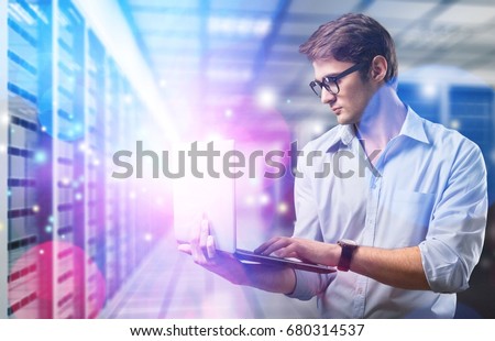 Man works in datacenter.