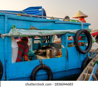 A Man Works Making Pho For Breakfast In The Cai Rang Floating Market In Can Tho, Mekong Delta, Vietnam