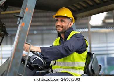 man in a yellow safety vest is driving a forklift. He is smiling and he is enjoying his job - Powered by Shutterstock