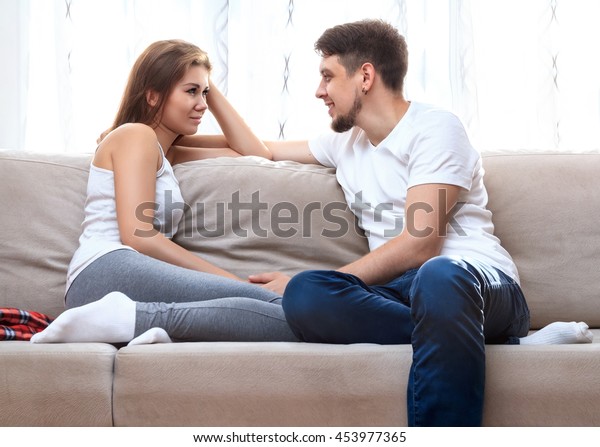 woman sitting on mans head