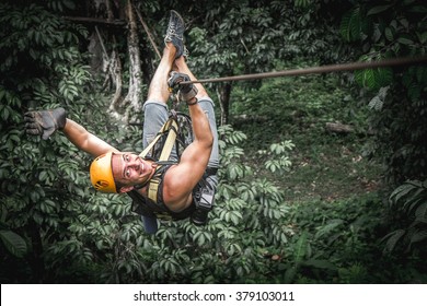 Man Zipline Flight In Jungle