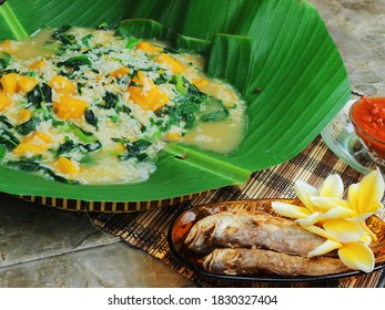 Manado Congee Or Bubur Manado (tinutuan), Served With Fried Salted Fish.