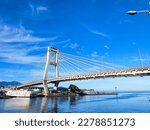 Manado, Indonesia – March 19, 2023: Soekarno bridge is one of icon at the Manado City, North Sulawesi. This brigde have leght about 1127 meter.  The view of Soekarno bridge with beautiful