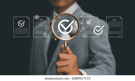 Management approval and project approval concepts, business process approval documents, Businessman holds magnifying glass with project approval icons, approves documents to grow business.