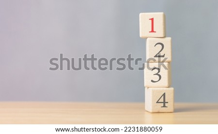 management concept Priority of any activity Set the priority of tasks Organize your to-dos. wooden cubes with numbers 1, 2, 3 and 4