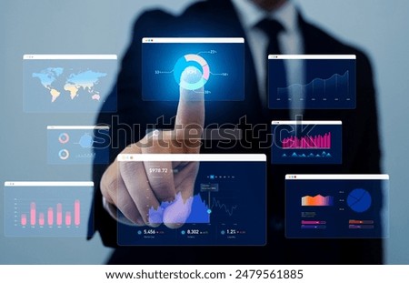 Management data System KPI connected in database for follow earnings,operations and sales data. Financial business data analytics graph dashboard.Businessman using KPI dashboard. 