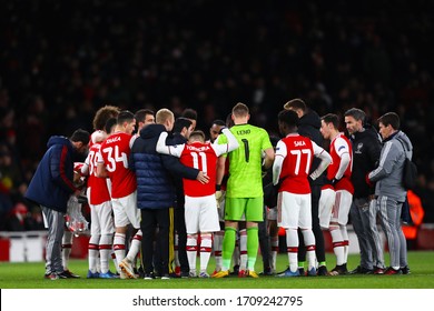 Manager of Arsenal, Mikel Arteta speaks to his players before extra time - Arsenal v Olympiacos, UEFA Europa League - Round of 32 Second Leg, Emirates Stadium, London, UK - 27th February 2020


