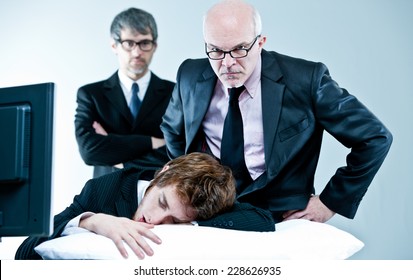 Manager And Boss Discover Lazy Employee Sleeping During Day Job