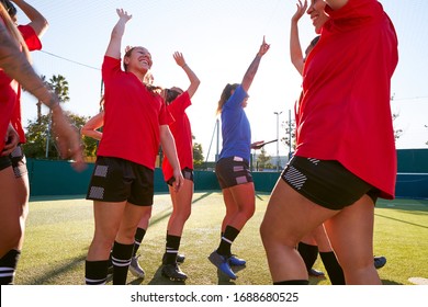 Manager Breaking From Huddle With Womens Football Team After Pep Talk Before Soccer Match