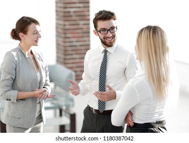 Manager And Business Team Talking In The Office.