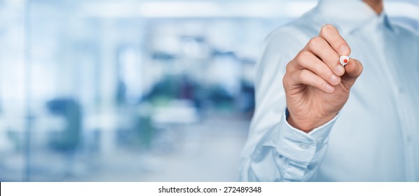 Manager (businessman) prepared to write on virtual board or glass in office (out of focus in background). Place your own text or graphics.  - Powered by Shutterstock