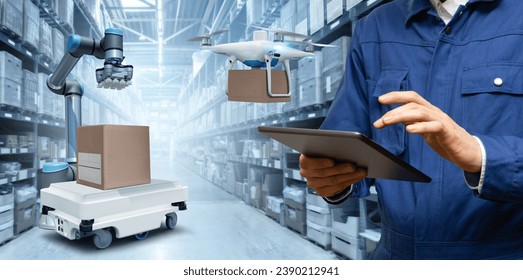 Manager with digital tablet in an automated warehouse with robots and drones. - Powered by Shutterstock