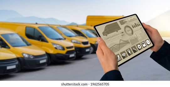 Manager With A Digital Tablet On The Background Of Vans. Fleet Management