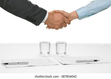 Manager And Employee Shake Hands. Welcoming A New Ally. Team Has A New Member. The Company Is Becoming Stronger.