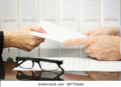 Manager Is Giving Employee Termination Of Contract To Read