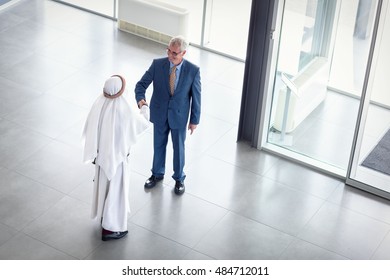 Manager of global company receive Arabian guest - Shutterstock ID 484712011
