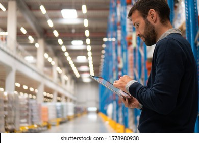 Manager holding digital tablet in warehouse	
 - Shutterstock ID 1578980938