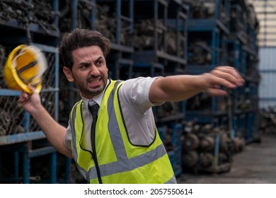 The Manager In The Industrial Plant Was Furious. Man With Angry Gesture In Parts Warehouse.