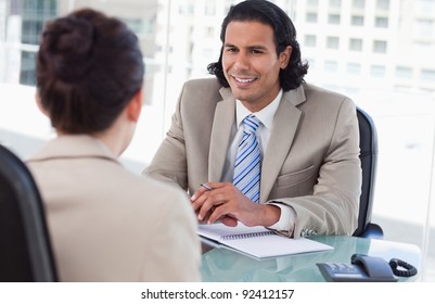 Manager interviewing a female applicant in his office - Shutterstock ID 92412157