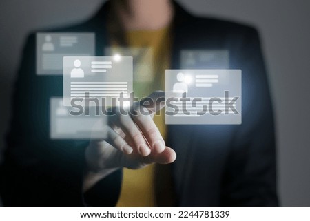 Manager looking at many different cv resume cards with candidates information. Human resources concept.Illustrative material for articles and web.