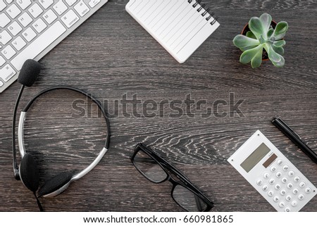 manager office with contact us set and notebook on wooden background top view space for text