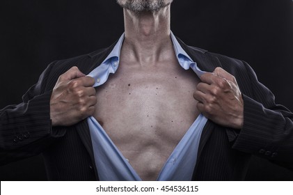 Manager In Pinstripe Suit Opens His Shirt To Wind His Body Calm Down From A Business Meeting