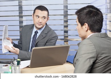 Manager Reviewing Workers Job Performance