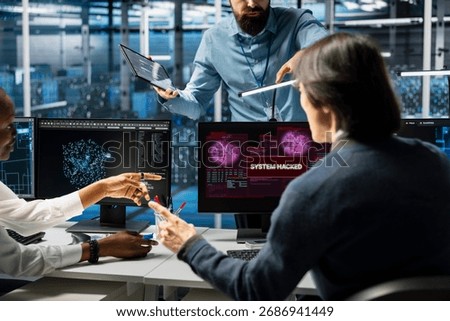 Manager and server hub technicians use AI LLM assistant to stop hacker steal sensitive company data. Data center supervisor and employees removing computer virus breaching security systems