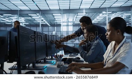 Manager supervising server room workers developing disaster recovery plans ensuring minimal downtime. Supervisor oversees data center technicians using data analytics to monitor performance, camera A