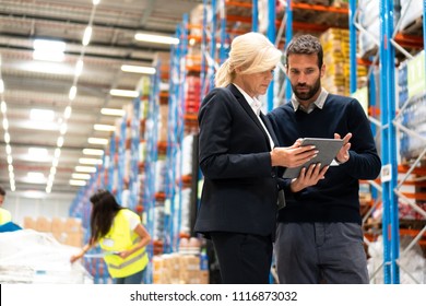 Manager and Supervisor in warehouse - Powered by Shutterstock