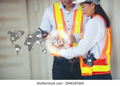 Manager Technical Industrial Engineer working and control robotics with monitoring system software and icon industry network connection on tablet. AI, Automation robot arm.