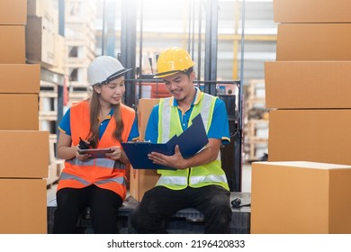 Manager  using tablet Checke-Commerce Online Orders e-businessonline. In store Background Warehouse Retail Center with  boxes global logistics network  Products Delivery Infographics in Logistics